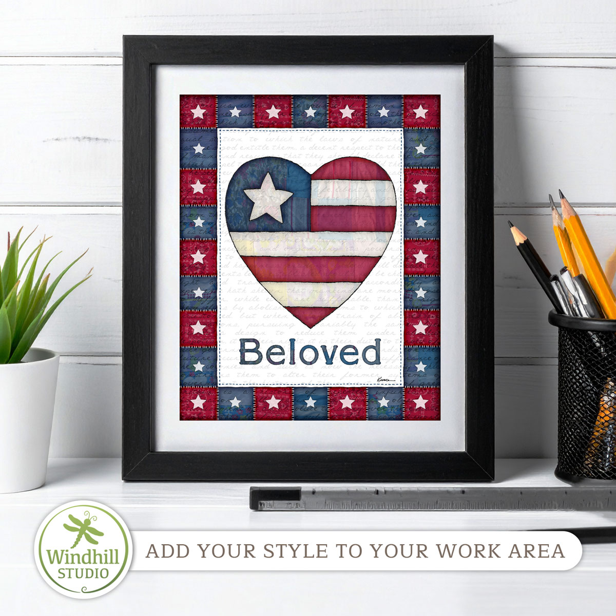 Patriotic Wall Art Printable – Beloved Americana Heart with quilted stars and red white blue fabric texture in a frame on a desk.