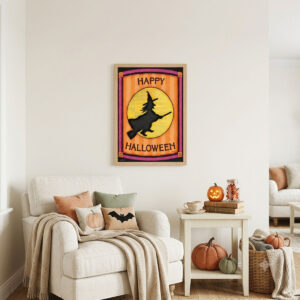 Printable Halloween wall art featuring a folk-art witch silhouette flying past a patchwork moon framed on a reading nook wall