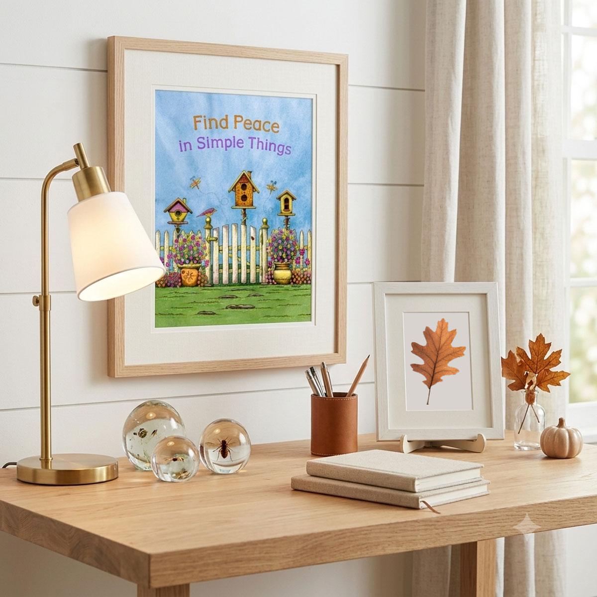 Garden Birdhouse Printable Wall Art featuring colorful birdhouses, flowers, dragonflies, and a white picket gate framed on an office wall