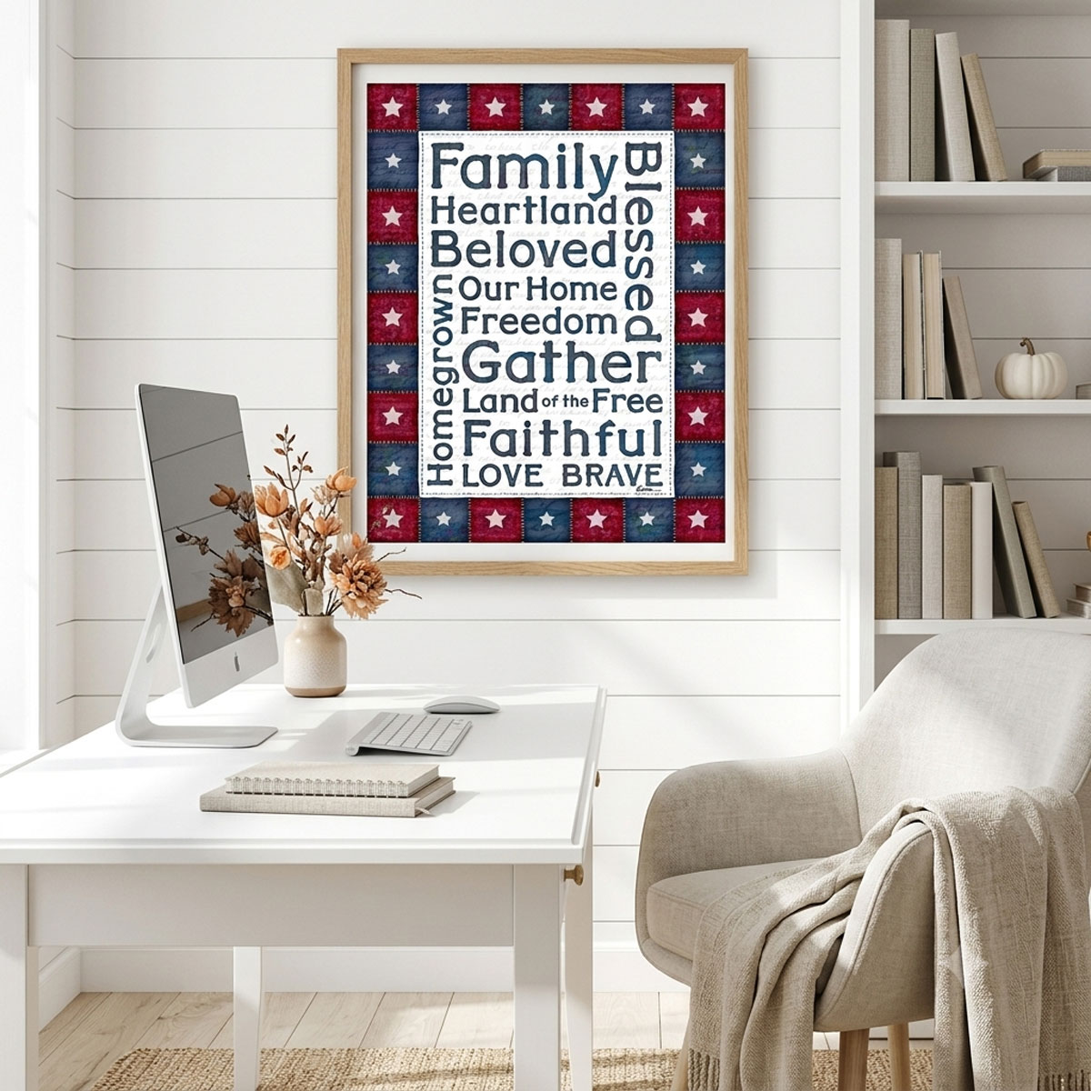 Photo showing a framed print of an American stars patchwork quilt border with patriotic words designed in the middle.