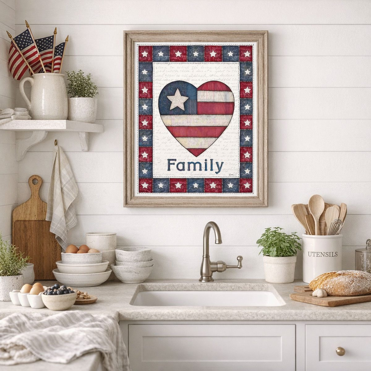 Photo showing a framed print of an American flag graphic inside of a heart with the word Family below it.