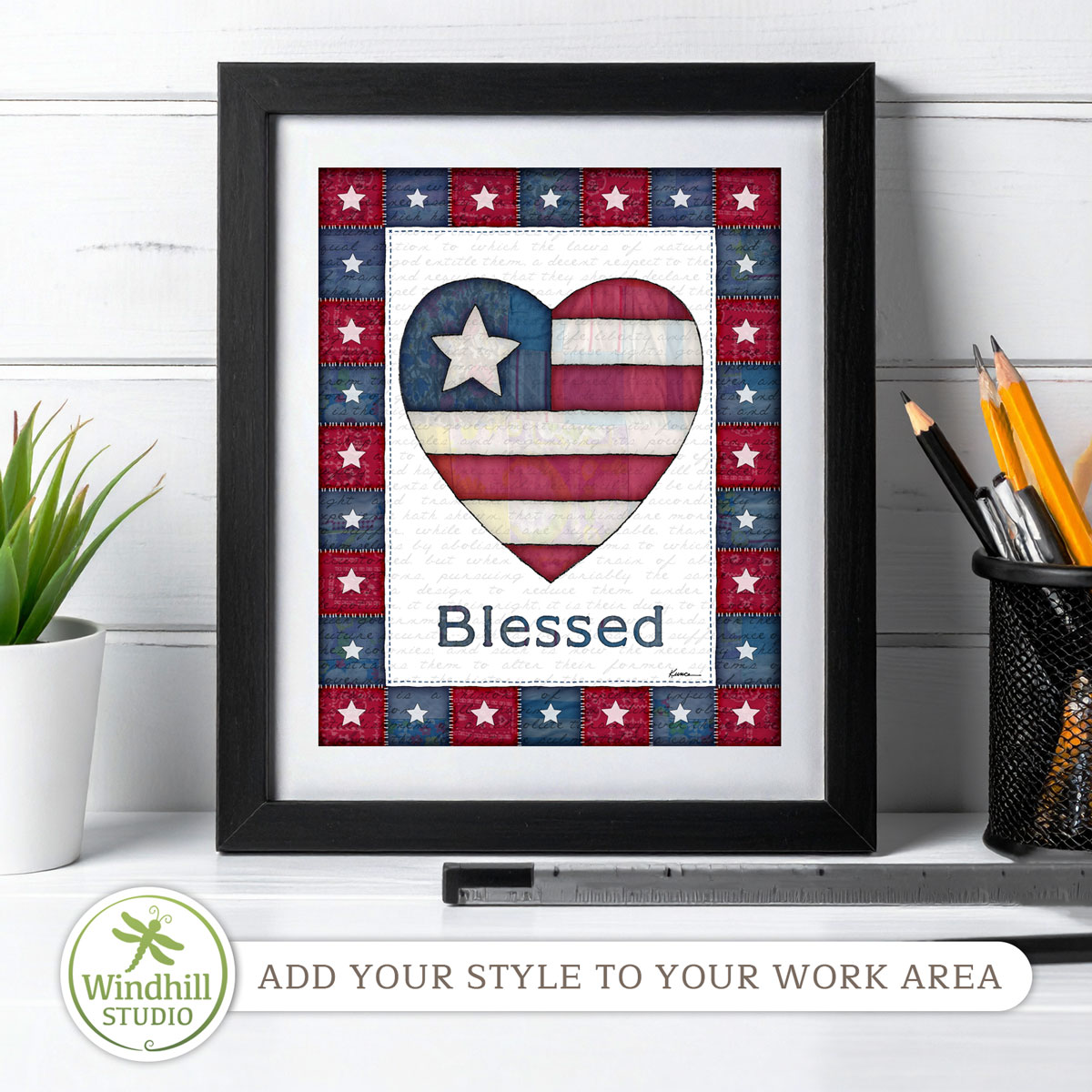 Patriotic Wall Art Printable - Blessed Americana Heart with quilted stars and red white blue fabric texture in a frame on a desk.