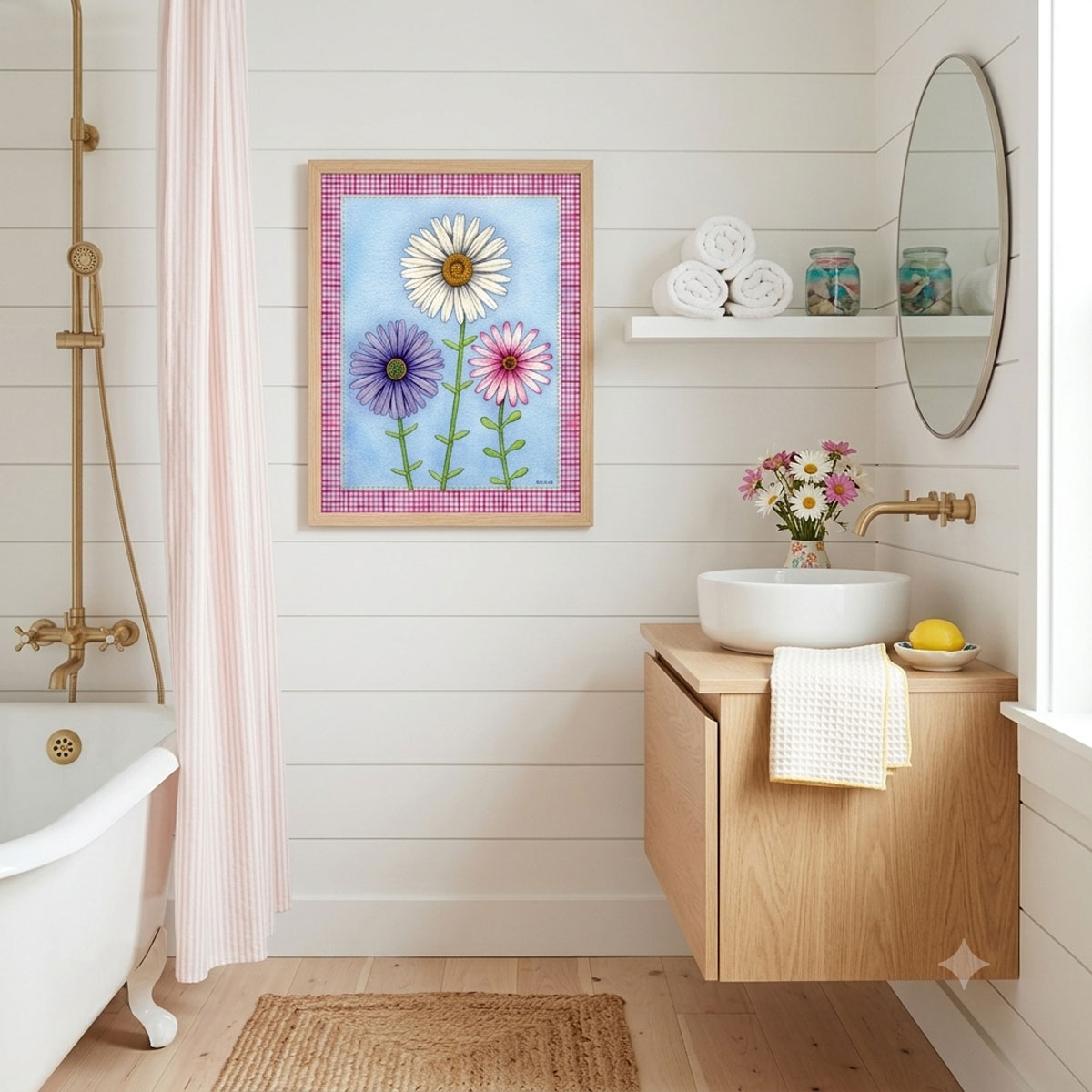 A mock-up photo of a room showing a framed print of a Trio of Daisies Floral Wall Art featuring white, purple, and pink flowers on a blue background with a pink gingham border.